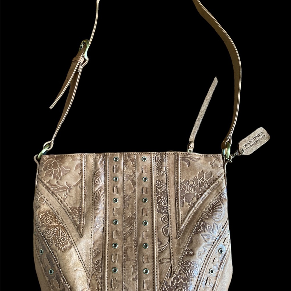 Leather embossed handbag. Great detail as shown.